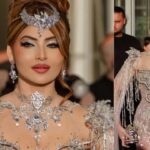 Urvashi Rautela in silver cape ensemble at Cannes 2026 red carpet