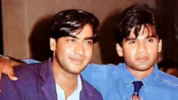 Ajay Devgn shares a rare vintage photograph with Suniel Shetty to wish him on his 65th birthday.